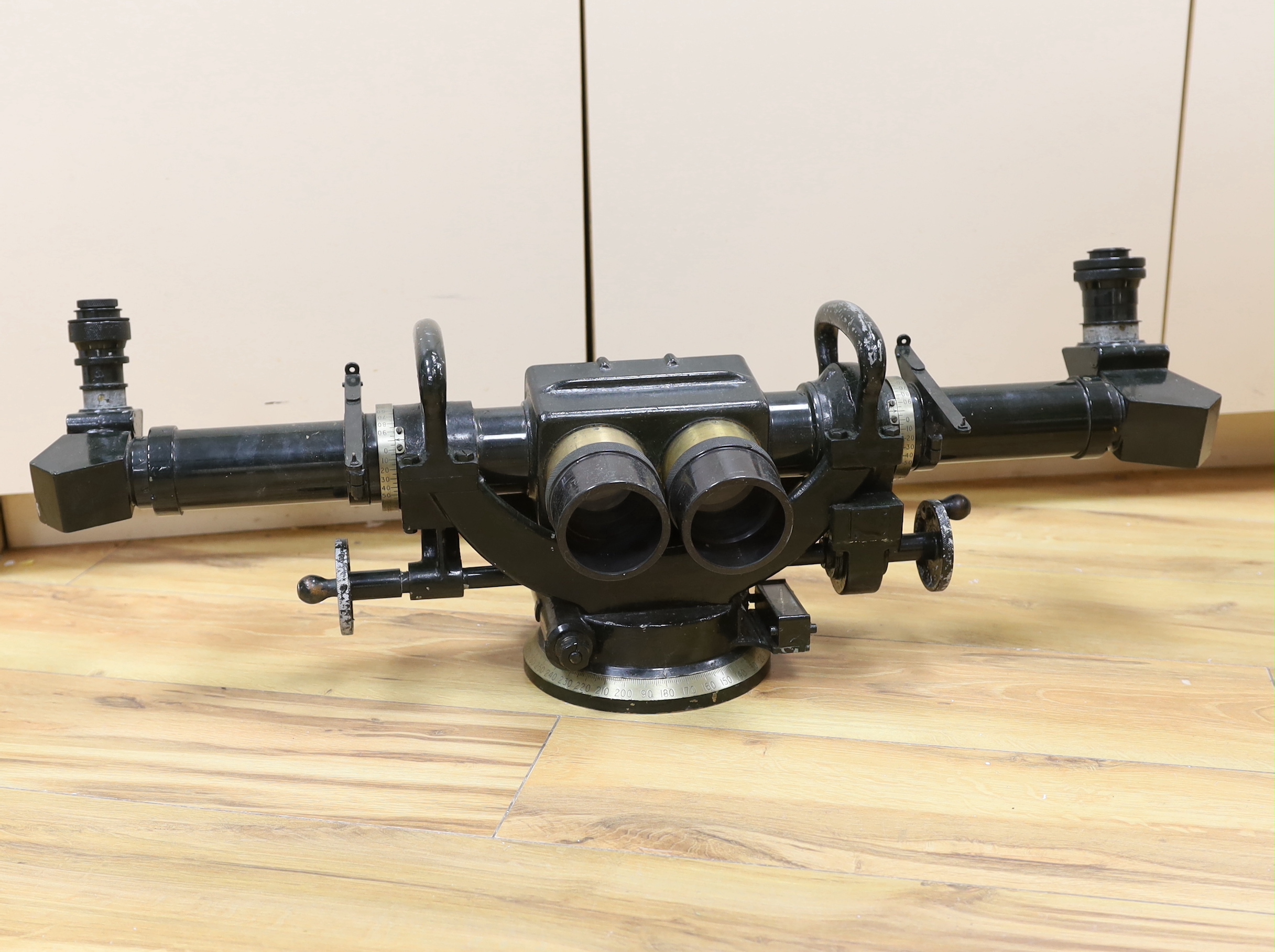 A WWII Telescope Identification A.A. Mk. III binocular sight (Rangefinder) in it’s original green-painted wooden transit case, case 88 x 30 x 35 cm